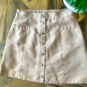 Pink mini skirt. Button up.